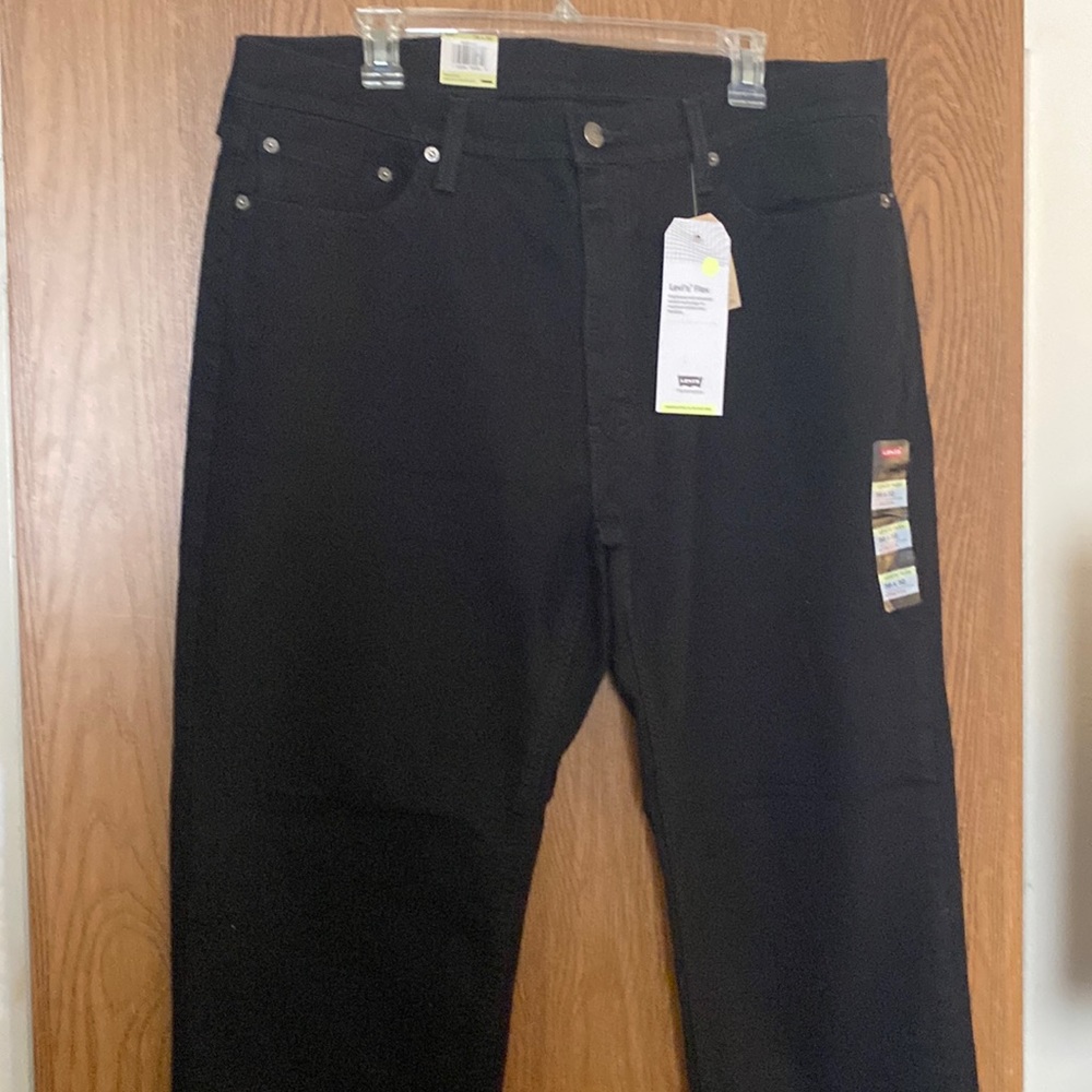 New with tags. Black Levi jeans